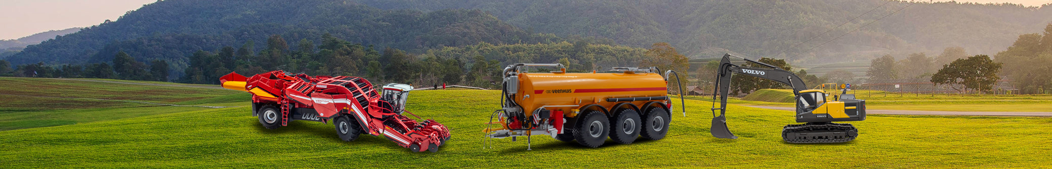 Graslandschap met diverse miniatuurmodellen in constructie en landbouw