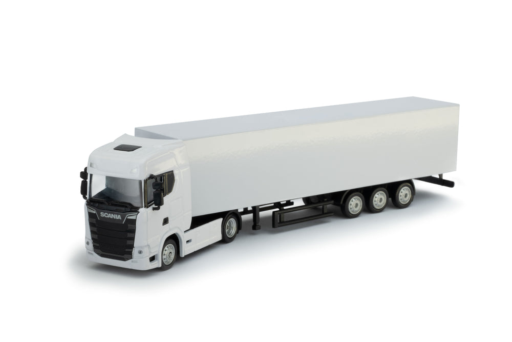 Zij/vooraanzicht van een witte Scania S series miniatuur vrachtwagen in de schaal 1:87 van het merk Holland Oto. 