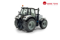 zij/achteraanzicht van een witte Lamborghini Spark 165 RCShift miniatuur tractor in de schaal 1 op 32.