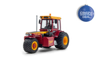 Een rode Vredo VT1403 miniatuur tractor, driewieler in schaal 1:32 van het merk Holland Oto Products