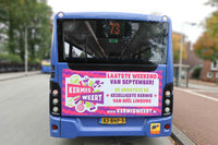 Achteraanzicht van de echte bus met de mooie kermis Weert bedrukking